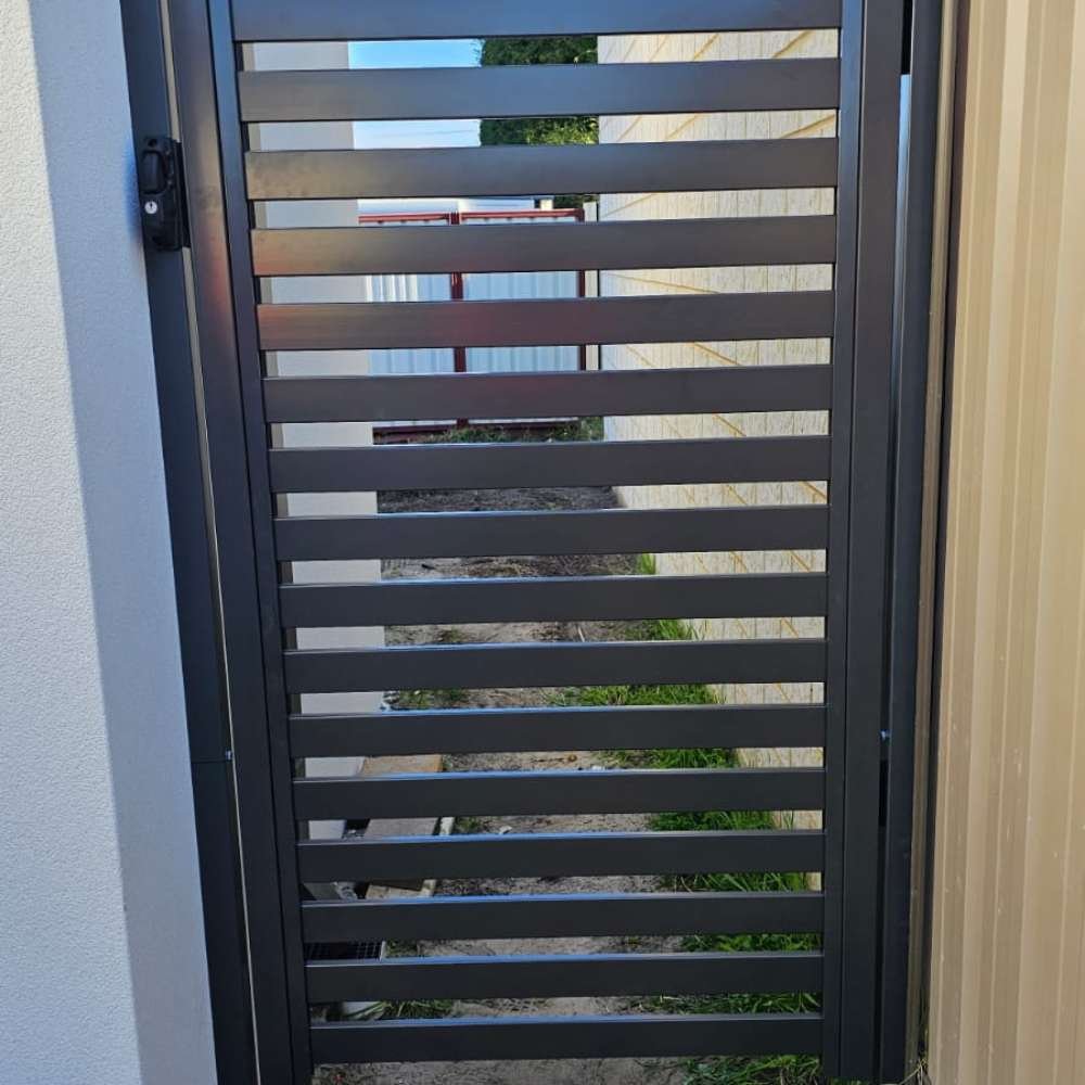 Aluminium slate gate installation for a modern and secure entrance | Fence Master Australia